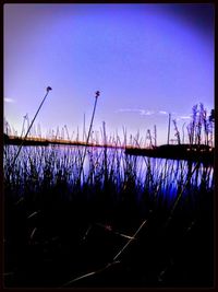 Scenic view of landscape against sky at dusk