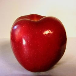 Close-up of apple against white background