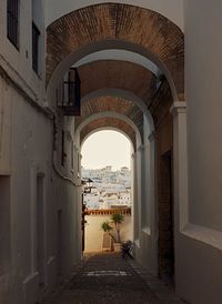 Alley amidst buildings in city