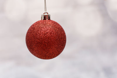 Close-up of hanging red christmas bauble