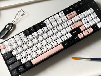 High angle view of computer keyboard on table