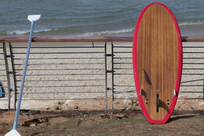 View of metallic railing on beach