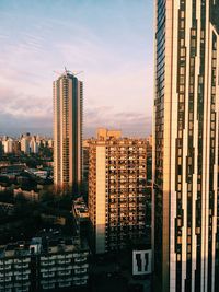 Modern buildings in city against sky