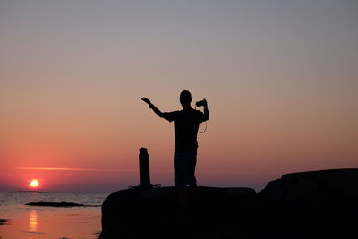 Scenic view of sea at sunset