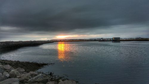 Scenic view of sea against dramatic sky