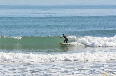 Man surfing in sea