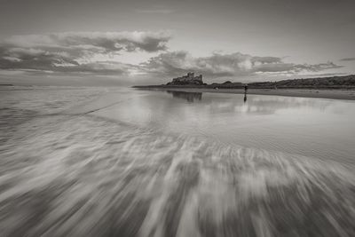 Blurred motion of waves on sea shore