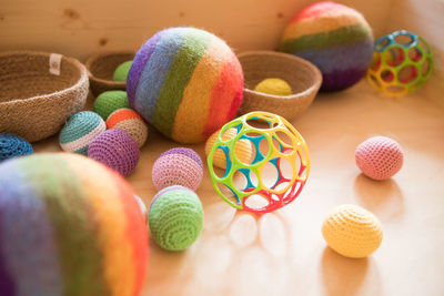 High angle view of multi colored balls on table