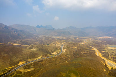 Aerial view of mountains against sky