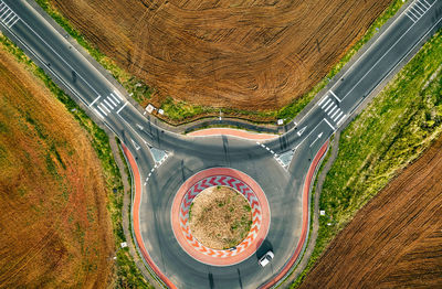 Aerial view of road infrastructure. roundabout