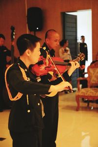 People playing at music concert