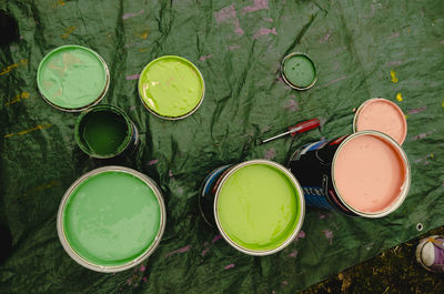 High angle view of various eggs on green table