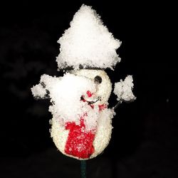 Close-up of christmas decoration against black background