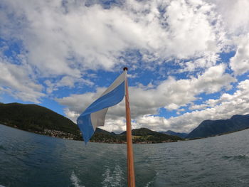 Low angle view of flag against sky