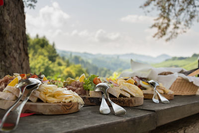 Close-up of food on table against sky