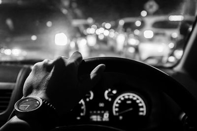 Close-up of hand in car