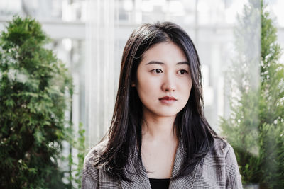 Portrait of confident chinese business woman in office. professional woman in co working