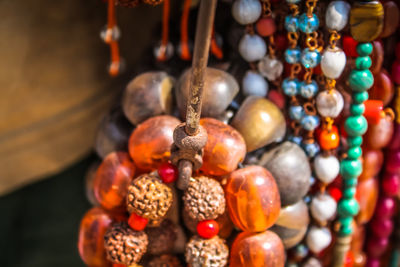 Close-up of multi colored jewelry for sale