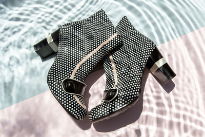 High angle view of person holding camera