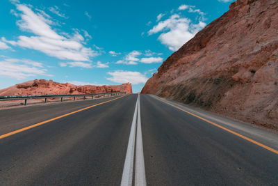 Empty road against sky