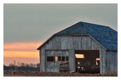 Built structure against sky during sunset