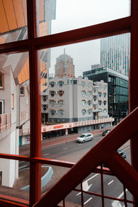 City street seen through glass window