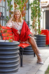 Young woman sitting on chair