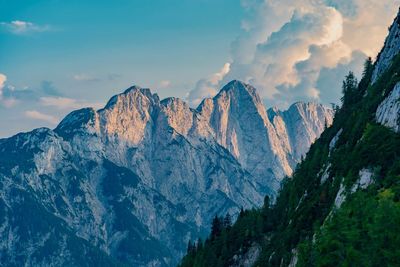 Panoramic view of snowcapped mountains against sky