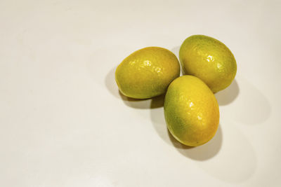 Close up kumquat fruits on white background