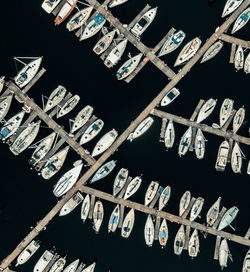 Aerial view of boats moored at harbor