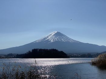 Scenic view of snowcapped mountain against sky