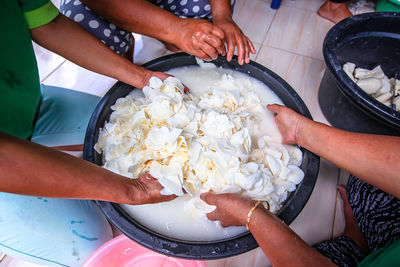 High angle view of people preparing food