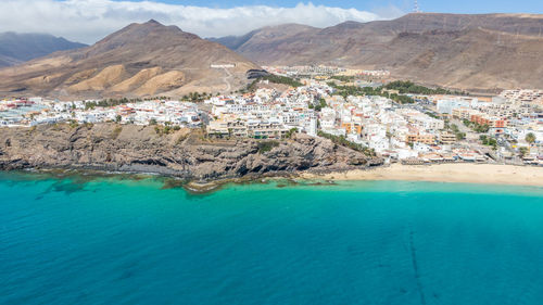 Aerial view of sea and buildings