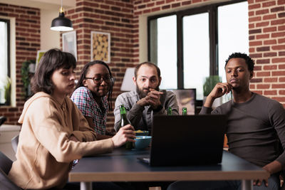 Business colleagues working at office
