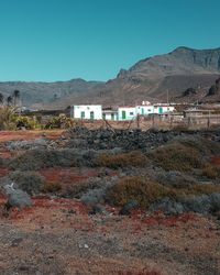 Scenic view of landscape against clear blue sky