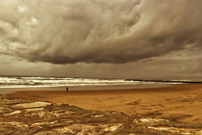 Scenic view of beach against sky