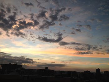 Silhouette of buildings at sunset