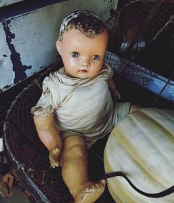 Portrait of cute baby girl sitting on floor