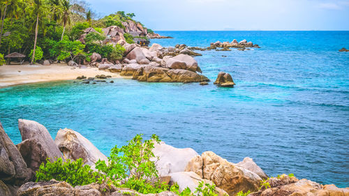 Scenic view of sea against blue sky