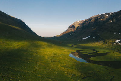 Panoramic view of mountain valley at sunrise