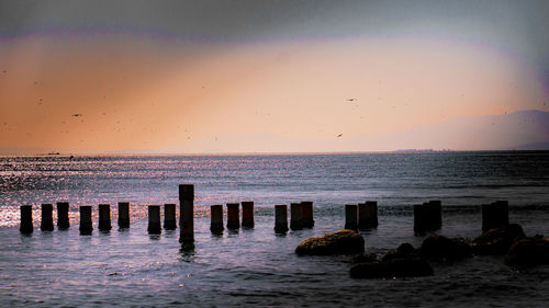 Scenic view of sea against sky during sunset