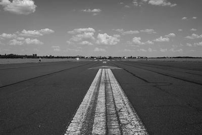 Road against cloudy sky