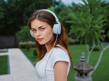 Portrait of young woman looking away