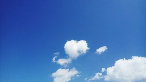 Low angle view of clouds in blue sky