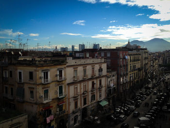 High angle view of street amidst buildings in city