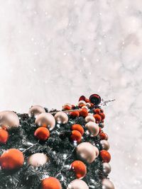 Close-up of snow on christmas tree during winter