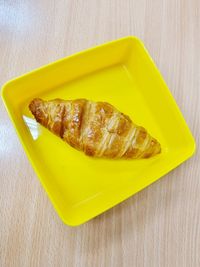 High angle view of bread in plate on table