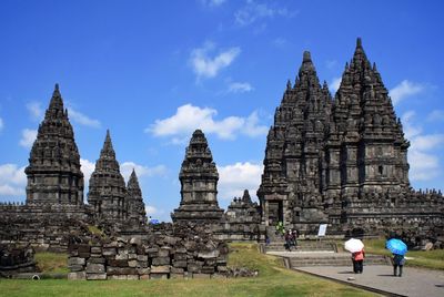 Group of people in temple against building