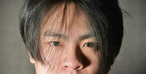 Close-up portrait of mid adult man