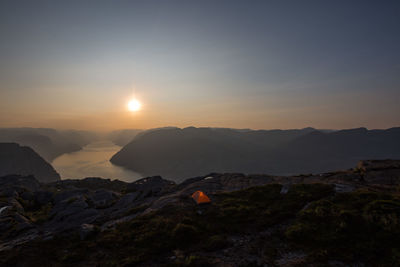 Scenic view of mountains against sky during sunset